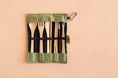 Reusable Eco-friendly Bamboo Cutlery Set on beige background, Alternative accessory, zero waste and plastic free concept. Copy spaceの写真素材