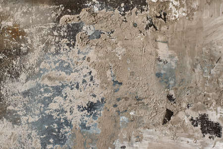 The texture of the old gray concrete wall for the background in the loft style with scuffs and...