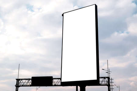 vertical billboard against the background of the cloudy sky. mockup, place for your information or...