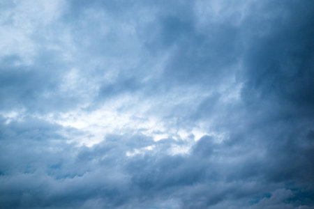 Black cloud and thunderstorm before rainy, Dramatic blue clouds and dark sky.の写真素材