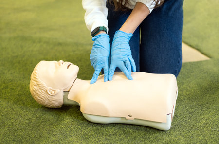 cpr training in class. Reanimation procedure on CPR doll.