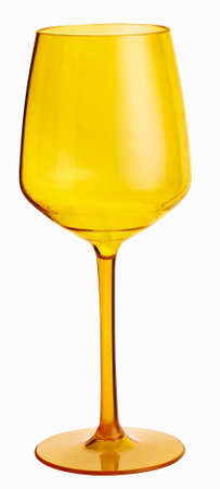 Yellow transparent wine glass isolated on white background. Tall pedestal stem.の写真素材