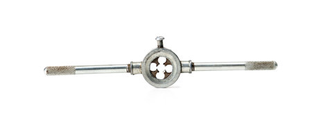 Metal threading die wrench tool isolated on white background, used for cutting external threads on...