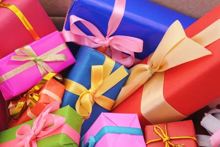Many bright gifts isolated on a white background.