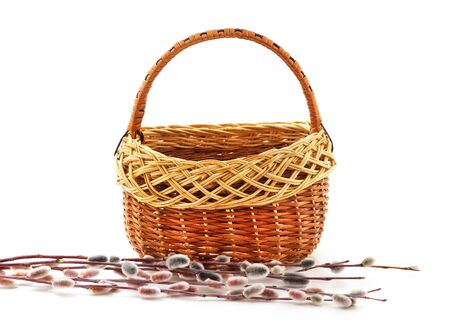 Basket with flowers isolated on a white background.の写真素材