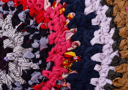 Beautiful knitted carpet isolated on a white background.の写真素材