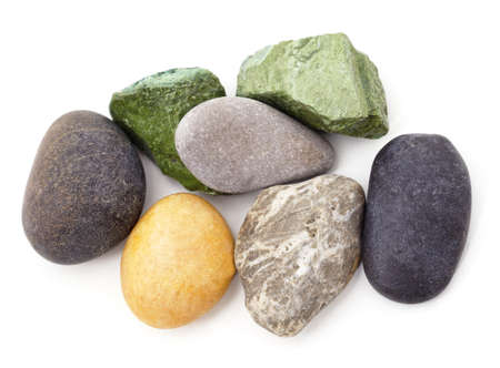 Multicolored sea stones isolated white background.