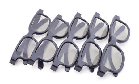 Many black glasses for cinema isolated on a white background.