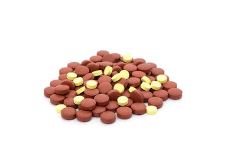 Different beautiful pills isolated on a white background.