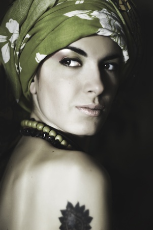 Sensual beautiful mysterious lady in the shadowsの写真素材