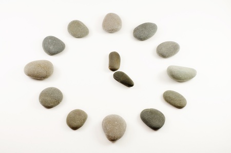 Stones laid out in the form of clockの写真素材