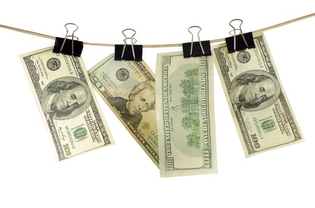 Clothesline cord with dollars isolated on a white backgroundの写真素材