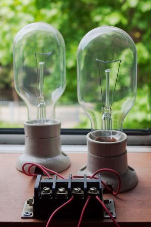 Two light lamps connected to terminal box with selective focusの写真素材