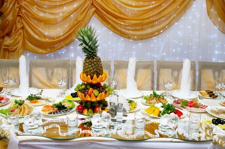 Table served with lots of food for wedding receptionの写真素材