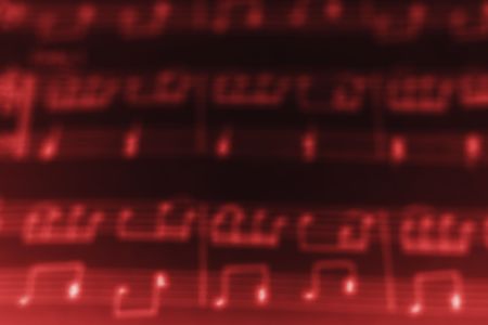 Stylized blurred red glowing music notes backgroundの写真素材