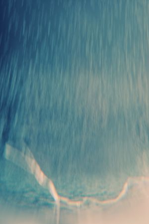 Abstract blur of rain-like background with lightningの写真素材