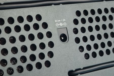 Back of device with power connector input and selective focusの写真素材