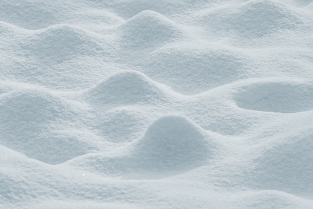 Hilly snow texture with selective focusの写真素材
