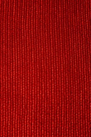 Vertical closeup of seamless red knitted fabric textureの写真素材
