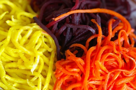 Closeup of grated Korean red carrot and celery with beetroot and selective focusの写真素材