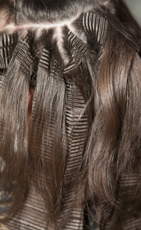 Closeup of crimp and straight hair locks with selective focusの写真素材