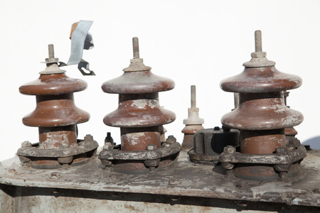 Old ceramic power line insulators の写真素材