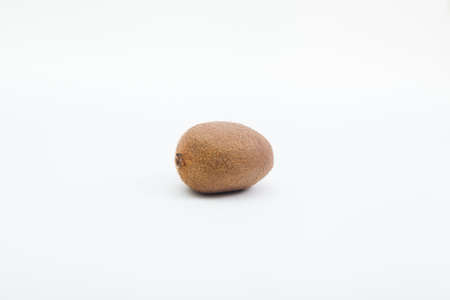 whole kiwi on white backgroundの写真素材