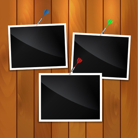 Photo frames on wooden background Insert your photos into frames のイラスト素材