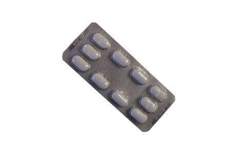 Tablets, medicines carved on a white backgroundの写真素材