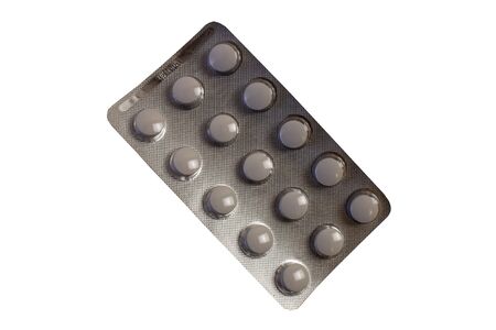 Tablets, medicines carved on a white backgroundの写真素材