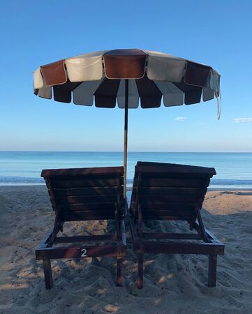 loungers on the beach in Phuketの写真素材