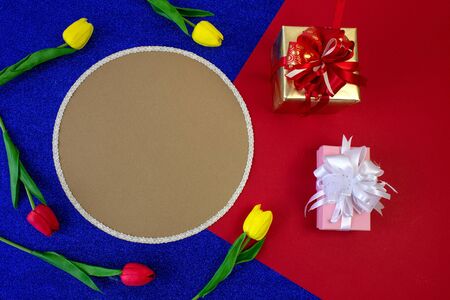 Circle shape card, deco items and yellow red flowersの写真素材