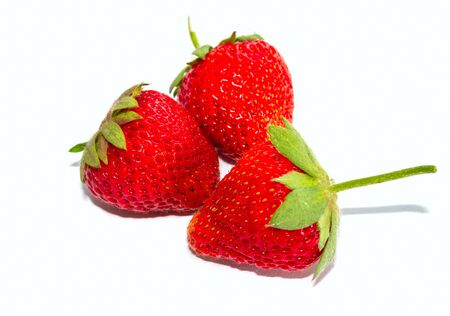 Strawberry closeup isolate on a white backgroundの写真素材