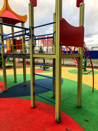 playground, slides, swings, a ladder in city park