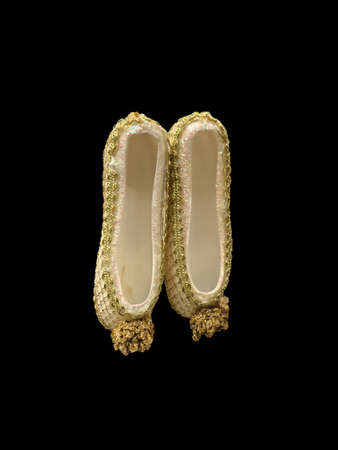 Christmas toy of gold shoes, isolateの写真素材