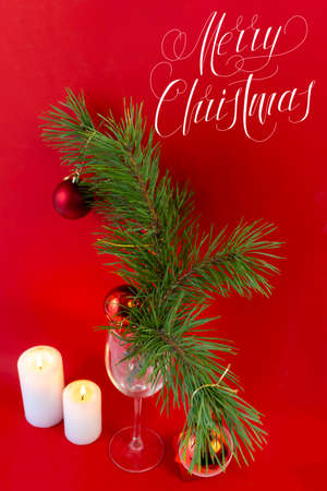 Christmas card, banner, flatlay with text - Merry Christmas on a red backgroundの写真素材