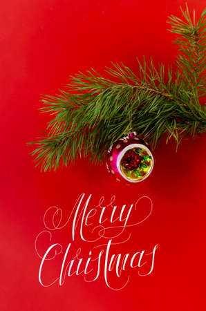 Christmas card, banner, flatlay with text - Merry Christmas on a red backgroundの写真素材