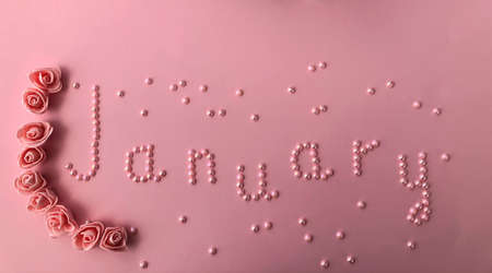 written the name of the month January beads