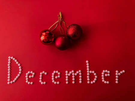 written the name of the month of December beadsの写真素材