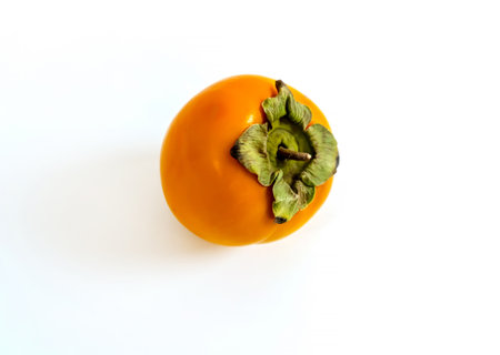 photo persimmon on a white background close upの写真素材