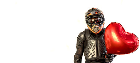 Happy Valentine's day! Mobile motorcyclist in a helmet with balloon heart for Valentine's Day