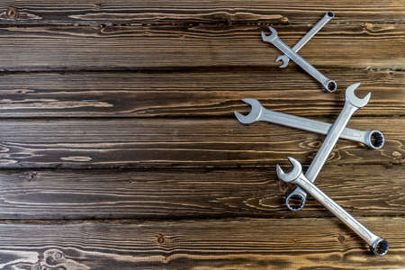 Happy Father's Day. Flat lay with Copy Space on Father's Day theme. Wooden background. On the topic of car mechanic and motorcyclist, bikerの写真素材