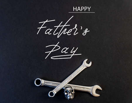 Happy Father's Day. Flat lay on father's day theme. Black background. On the topic of car mechanic...