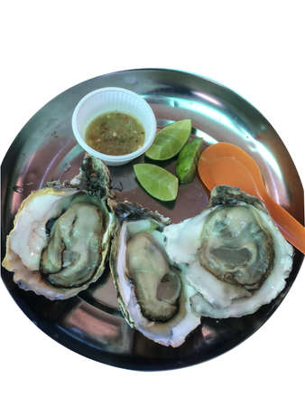 plate with fresh oysters