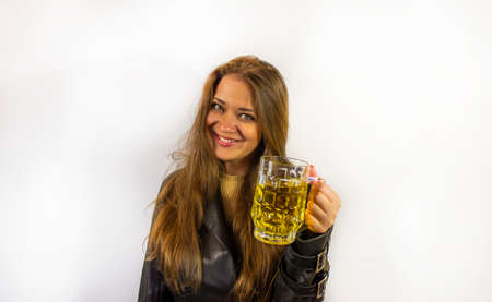 young beautiful woman with a mug of beerの写真素材
