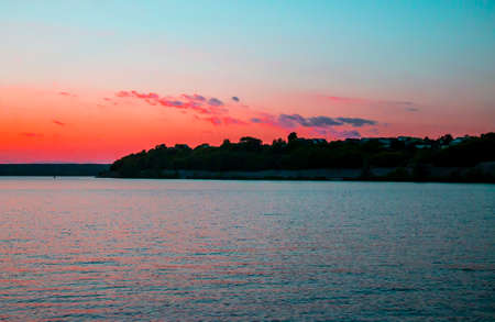 Sunset on the river, lake in artistic processingの写真素材