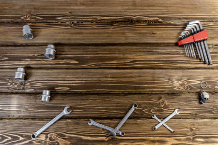 Happy Father's Day. Flat lay with Copy Space on Father's Day theme. wooden background. On the topic of car mechanic and motorcyclist, bikerの写真素材
