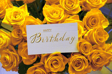 postcard , Internet banner with a birthday greeting, with the inscription - happy birthday, a bouquet of flowers with a note of congratulations, rosesの写真素材