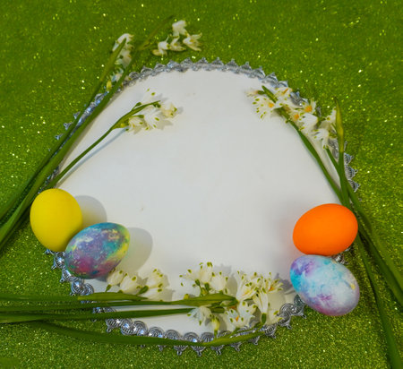 happy easter! Flat Lay, postcard or Internet banner with Copy Space on Easter. snowdrop flowers and...