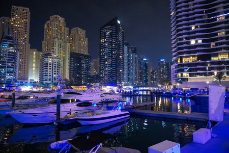 Dubai Marina in Dubai, UAE. View of the skyscrapers and the canal, view at night,の写真素材